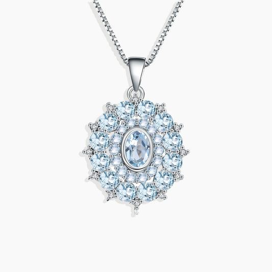 Sky Blue Topaz Spiral Necklace in Sterling Silver