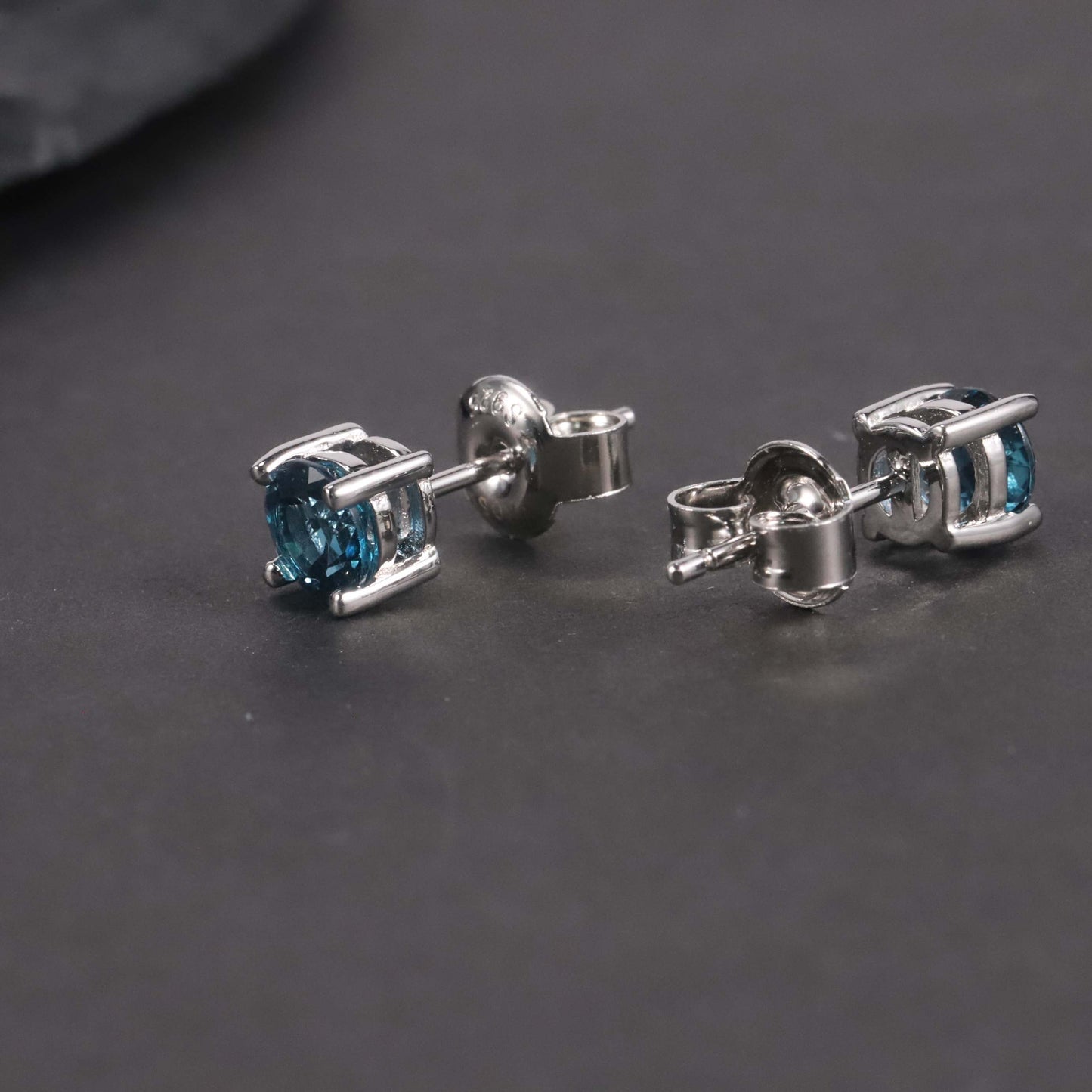 Round Cut Stud Earrings in Sterling Silver -  London Blue Topaz